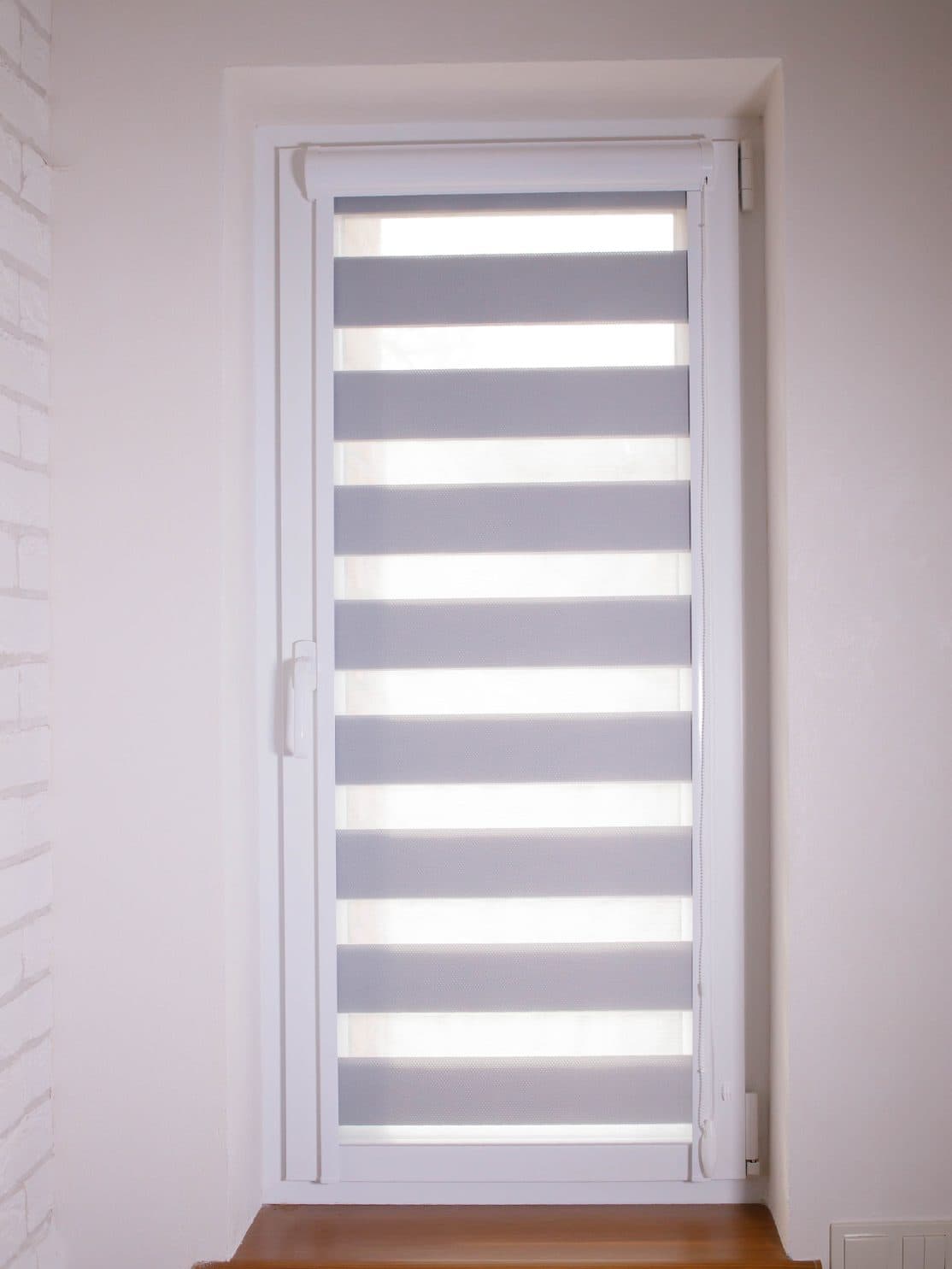 Roller blinds fitted to a residential window